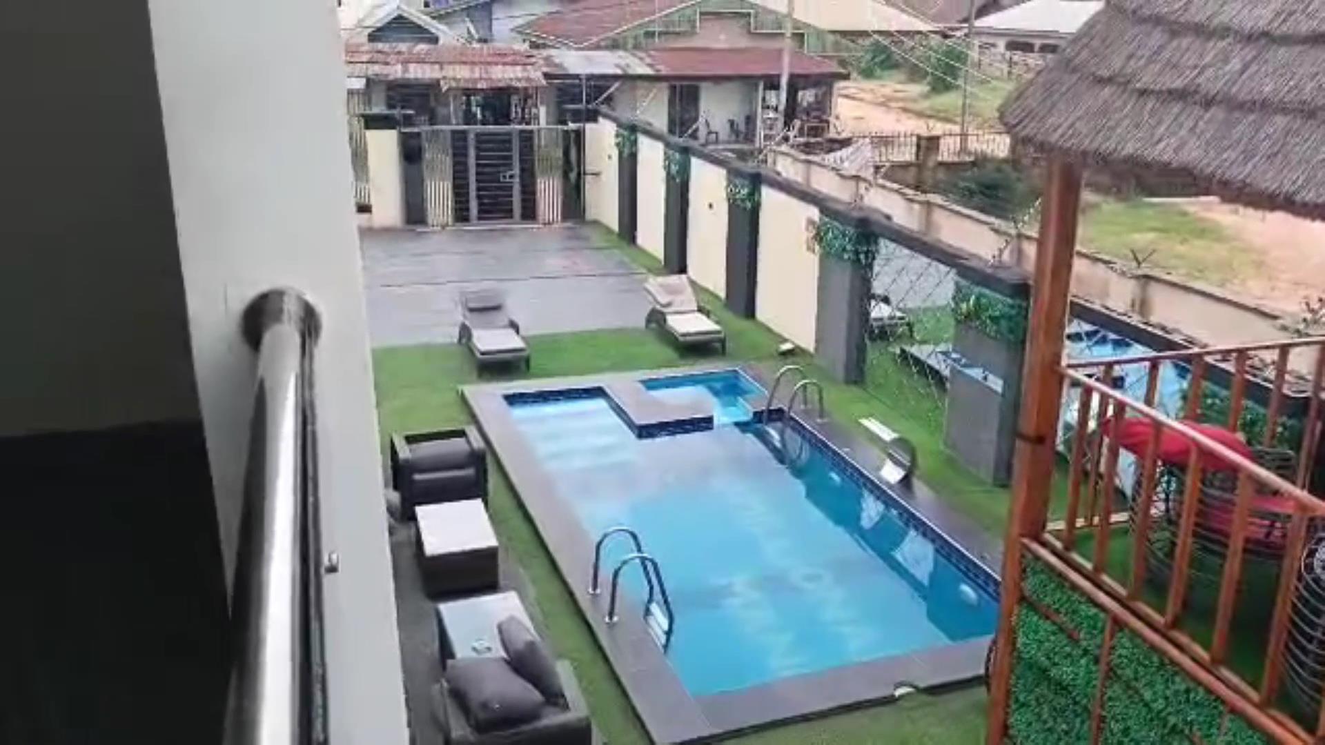 view of the pool lounge from upstairs broader view