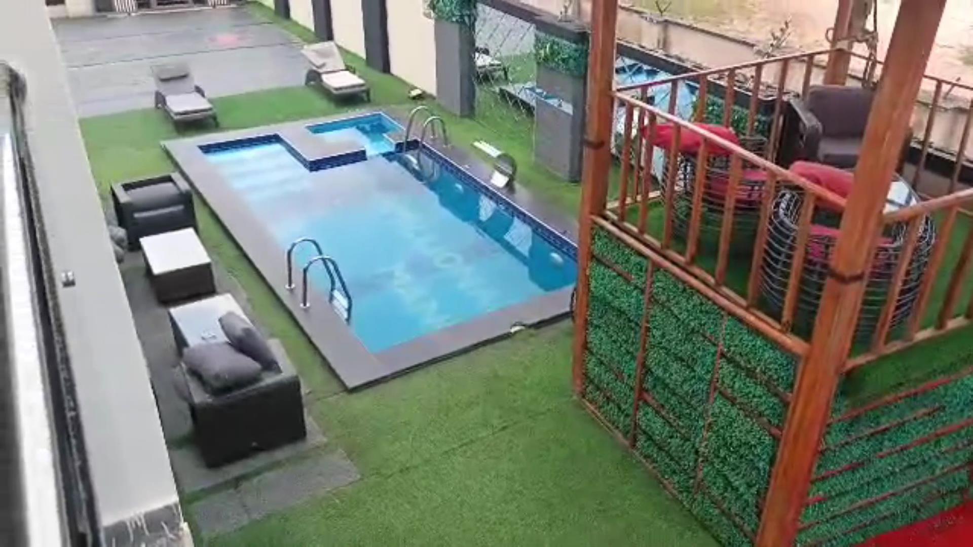 view of the pool lounge from upstairs balcony