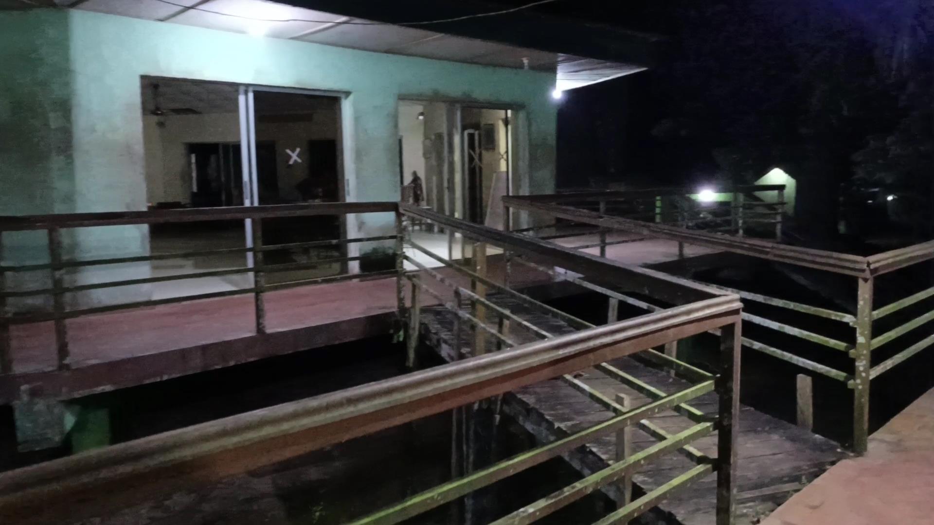 Okomu National Park Chalets at night.jpg